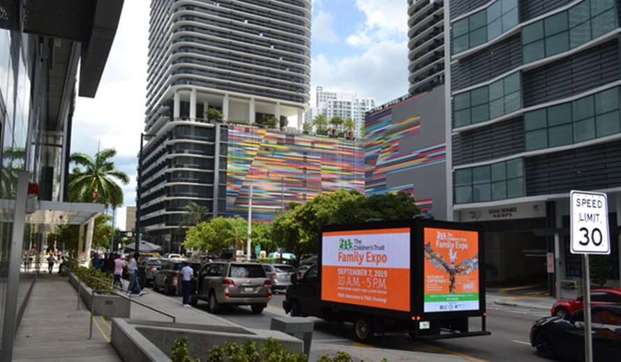 LED mobile truck displaying Family Expo advertising