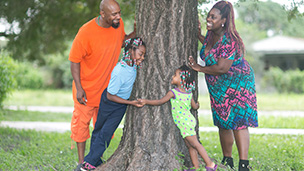African American family at the park.