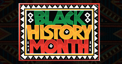 Bright red, black, white, yellow and green sign reading Black History Month.